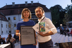 Chris and Michelle at Ars Electronica in 2021 after winning the award for Digital Humanity.